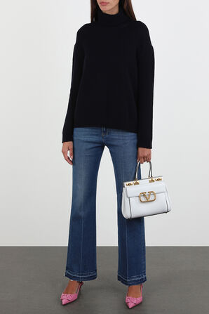 מכנסי גי'נס בגזרה ישרה בשטיפה בינונית VALENTINO